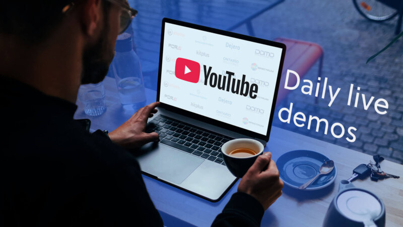 Man viewing a laptop with all the partner logos in the background with the YouTube logo in the foreground. Text states: Daily live demos
