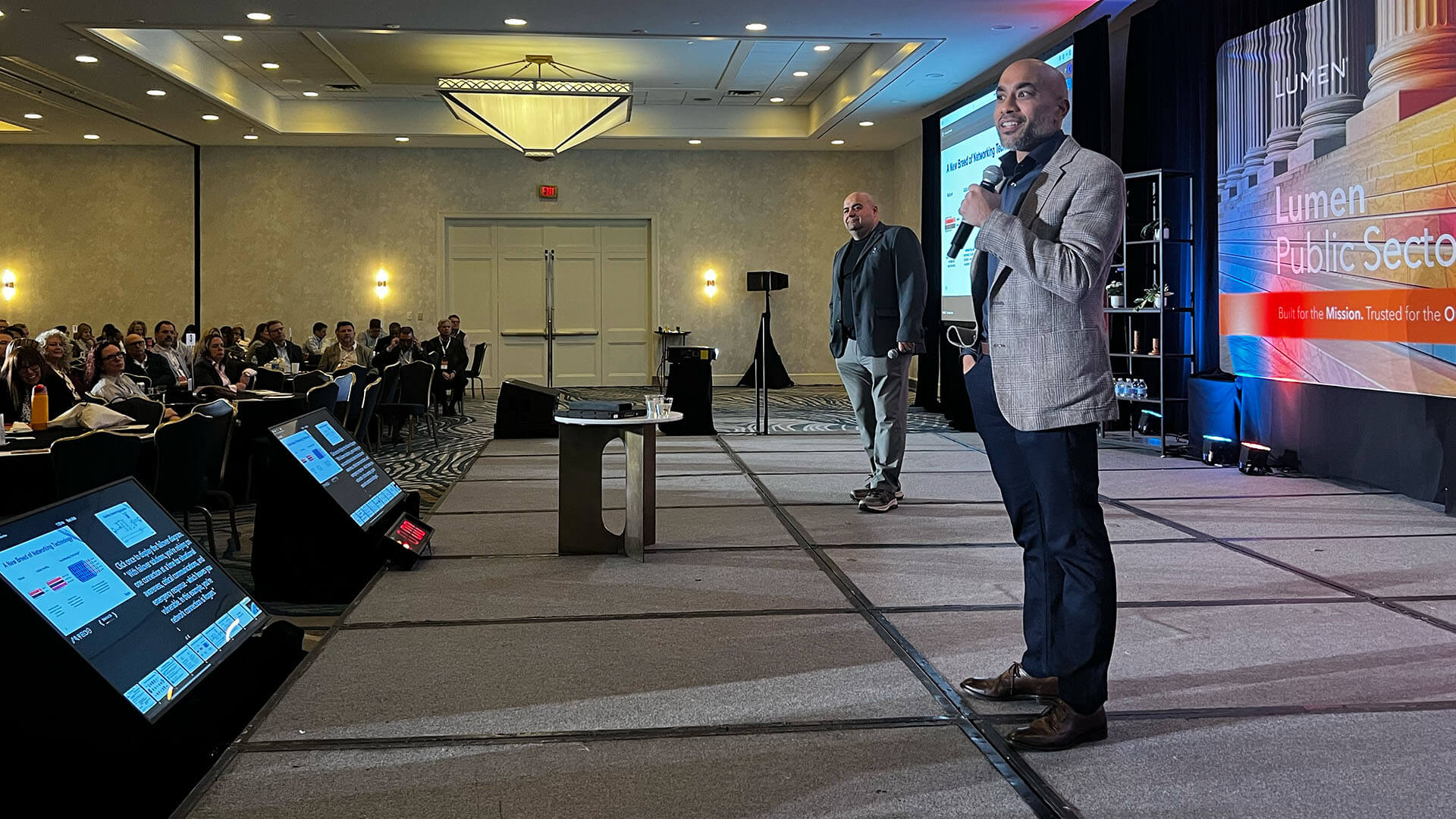 Main stage at the Lumen SKO, Kevin and Bogdan presenting with Kevin speaking